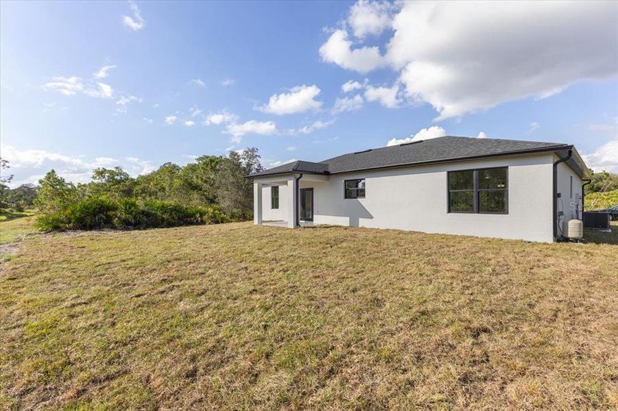 Exterior details and patio area of a home in , Sebring (Image 3). Exterior details and patio area of a home in , Sebring (Image 3).