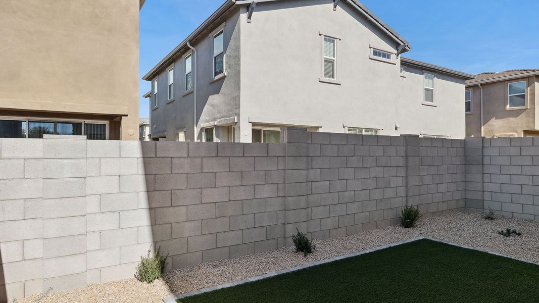 Exterior details and patio area of a home in Talinn Towns at Desert Ridge, Phoenix (Image 3).