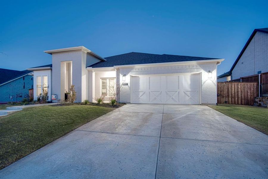 Front exterior of a new home in Sweetgrass, Haslet, TX, highlighting curb appeal (Image 24).