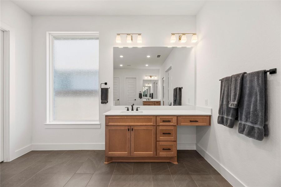 Furnished interior view inside a new home in Bridgeland, Cypress (Image 32).
