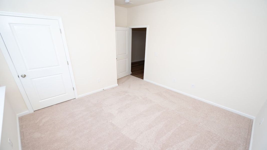 Representative unfurnished interior of a home built from the CALI by D.R. Horton in Lochaven, Conway (Image 18).
