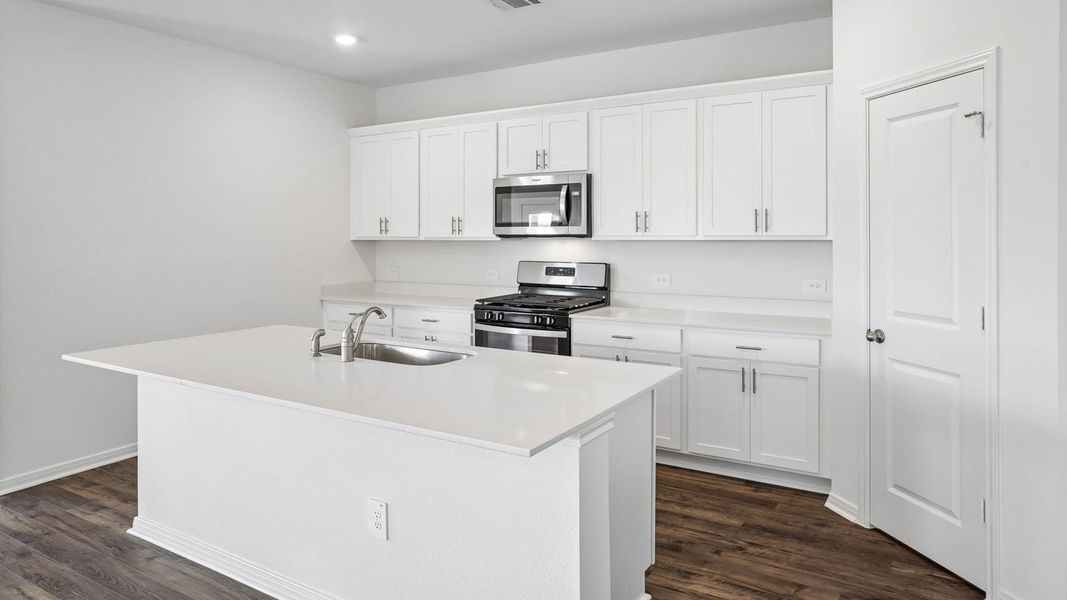 Furnished interior view inside a new home in Prairie Lakes, Buda (Image 7).