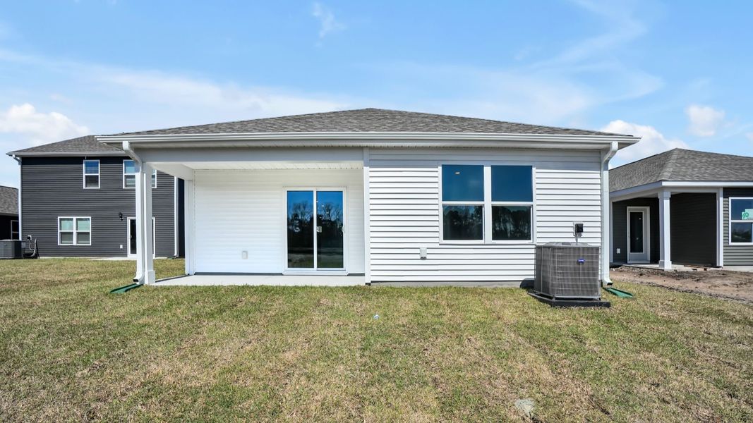 Exterior details and patio area of a home in Lockwood Landing, Supply (Image 3).
