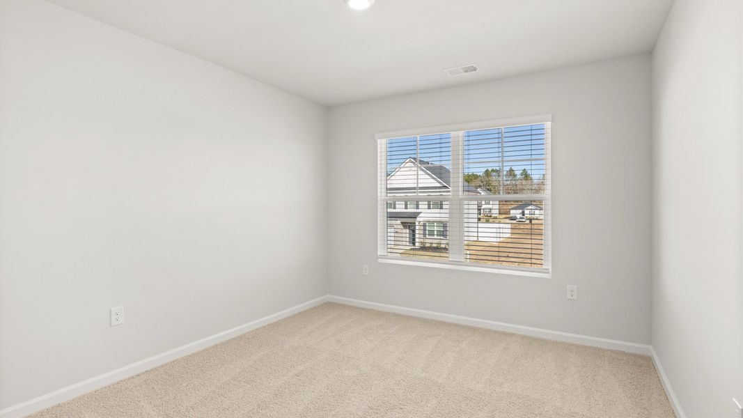 Spacious, unfurnished interior of a new home in Byrd Village, Graniteville (Image 22).