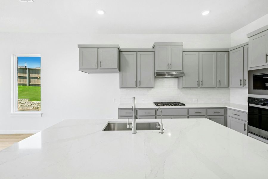 Furnished interior view inside a new home in The Colony, Bastrop (Image 7). Furnished interior view inside a new home in The Colony, Bastrop (Image 7).