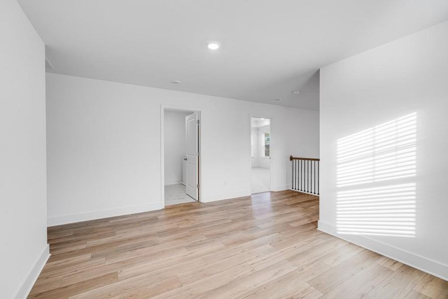 Spacious, unfurnished interior of a new home in Wellington Estates, Madison (Image 19).