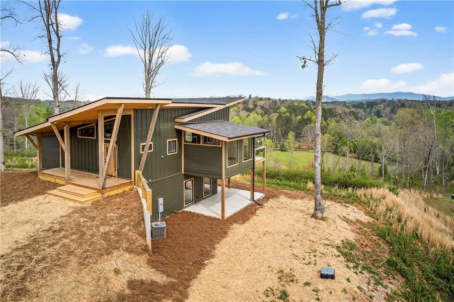 Exterior details and patio area of a home in , Ellijay (Image 26).