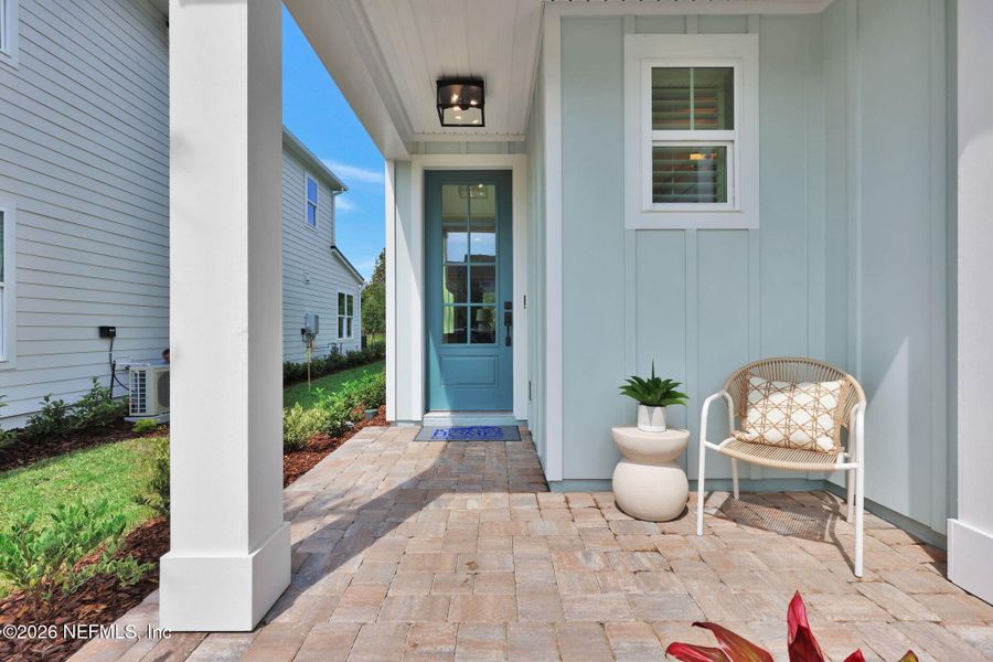 Exterior details and patio area of a home in Mariposa at EverRange 40' Series, Jacksonville (Image 27).