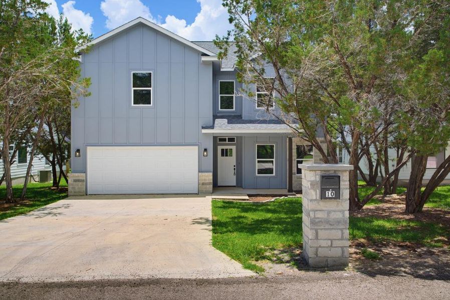 Front exterior of a new home in , Wimberley, TX, highlighting curb appeal (Image 1). Front exterior of a new home in , Wimberley, TX, highlighting curb appeal (Image 1).