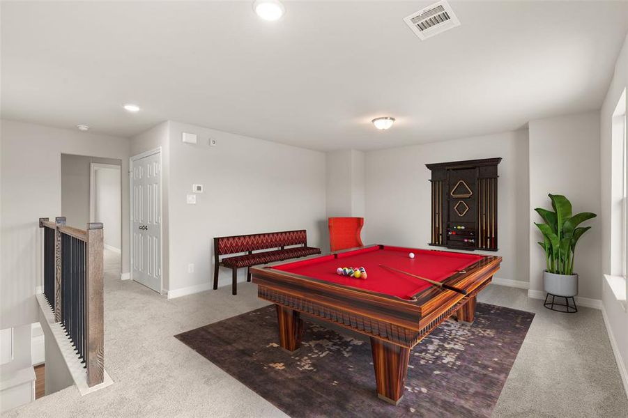 As you make your way upstairs this exceptional game room is a standout feature in this remarkable property, offering a space that combines luxury and fun for all ages.