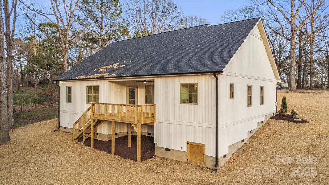 The lot slopes toward the back, but levels out for some usable space