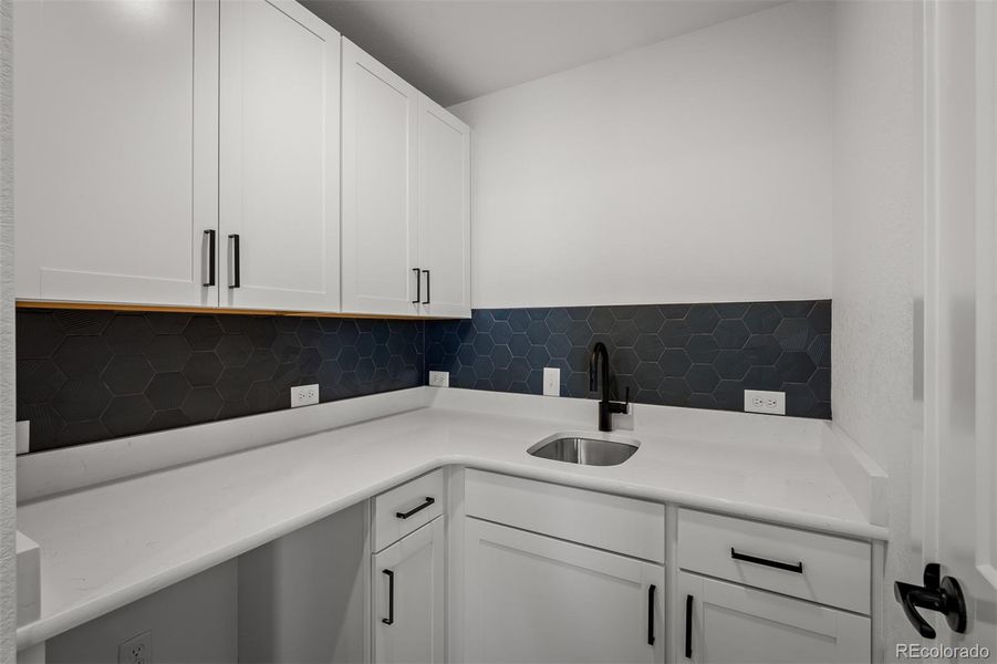 Furnished interior view inside a new home in Revel Crossing at Wolf Ranch - The Panorama Collection, Colorado Springs (Image 8).