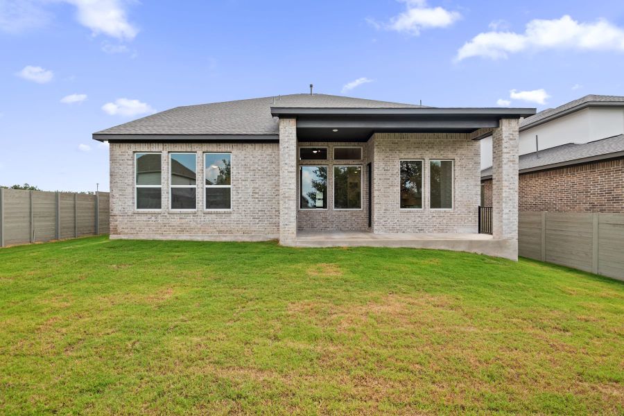 Exterior details and patio area of a home in Wolf Ranch, Georgetown (Image 28).