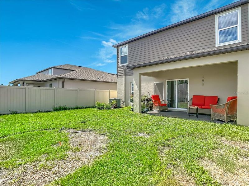 Exterior details and patio area of a home in Two Rivers, Zephyrhills (Image 25).