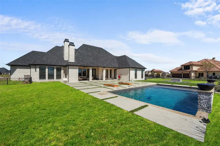 Exterior details and patio area of a home in , Rockwall (Image 24).