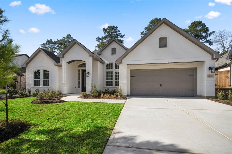 The perfect blend of elegance and functionality, this home boasts an open-concept layout and a spacious 3-car tandem garage, outside weatherproof electrical outlets