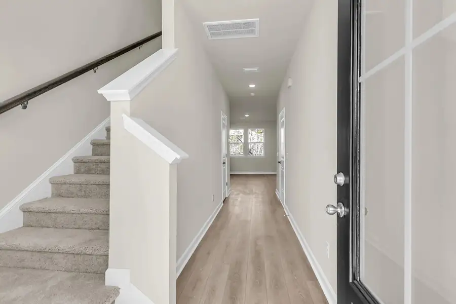Spacious, unfurnished interior of a new home in Windward Village, Summerville (Image 10). Spacious, unfurnished interior of a new home in Windward Village, Summerville (Image 10).