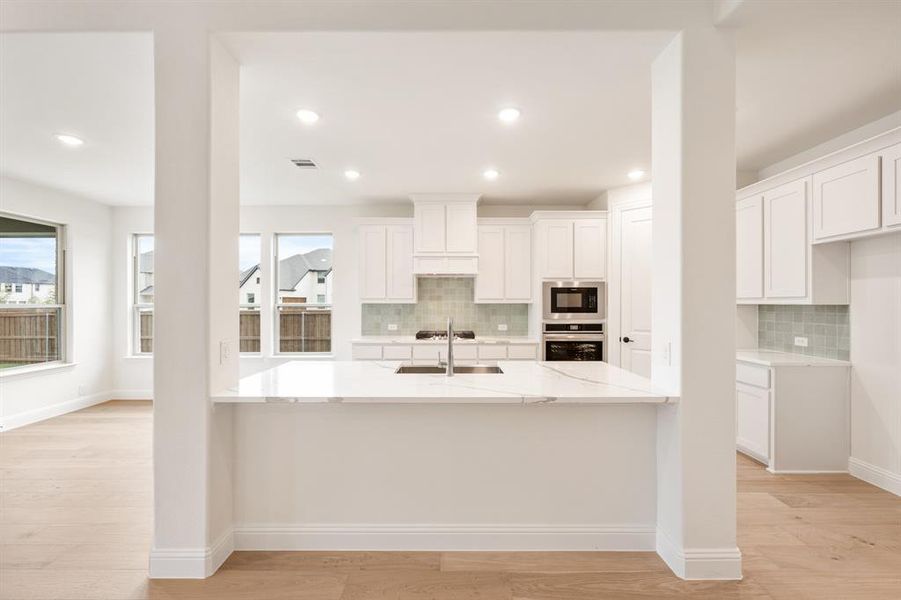 Furnished interior view inside a new home in Windsong Ranch Classic 61, Prosper (Image 6). Furnished interior view inside a new home in Windsong Ranch Classic 61, Prosper (Image 6).
