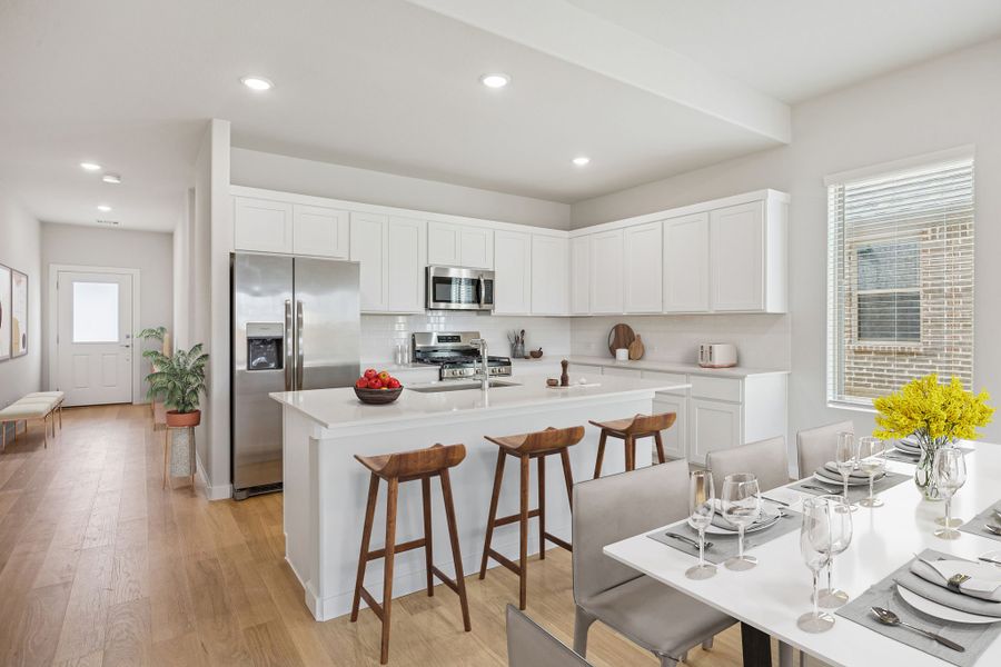 Kitchen in the Stanley II home plan by Trophy Signature Homes – REPRESENTATIVE PHOTO
