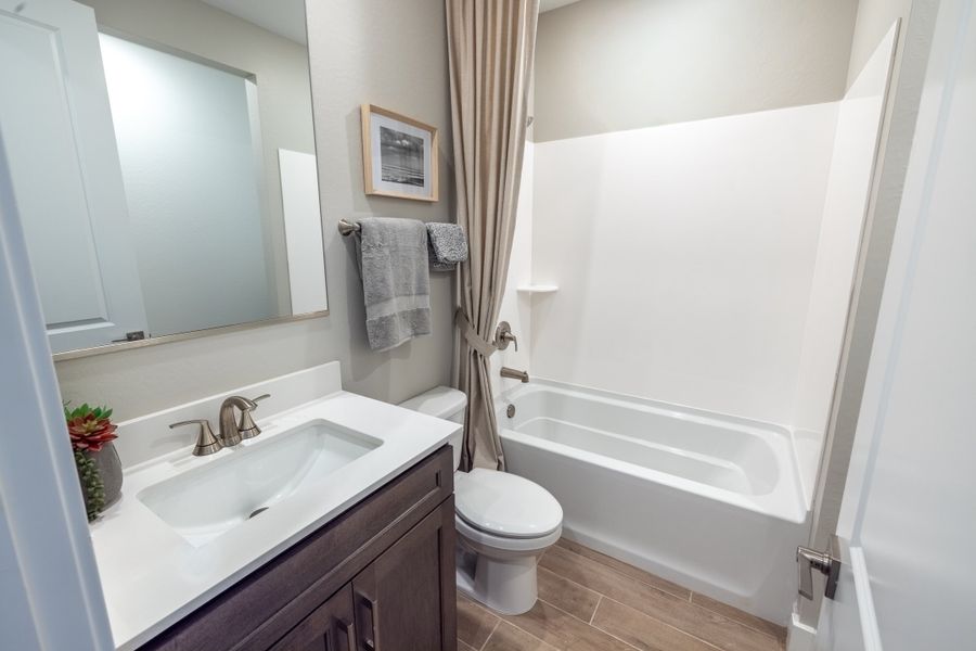 Furnished interior view inside a new home in Legacy Place, Glendale (Image 26).