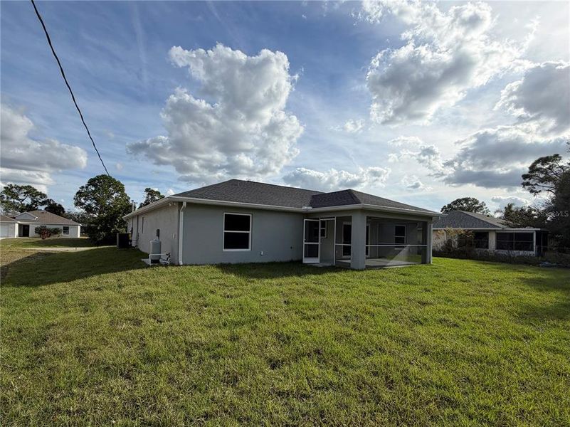 Exterior details and patio area of a home in , North Port (Image 25).