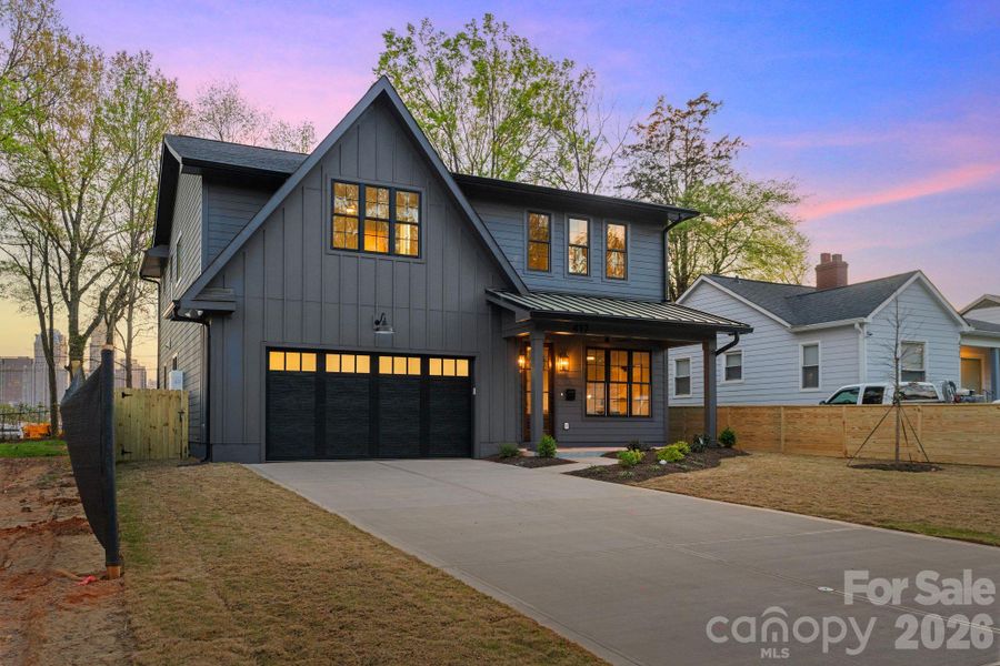 Front exterior of a new home in , Charlotte, NC, highlighting curb appeal (Image 1). Front exterior of a new home in , Charlotte, NC, highlighting curb appeal (Image 1).