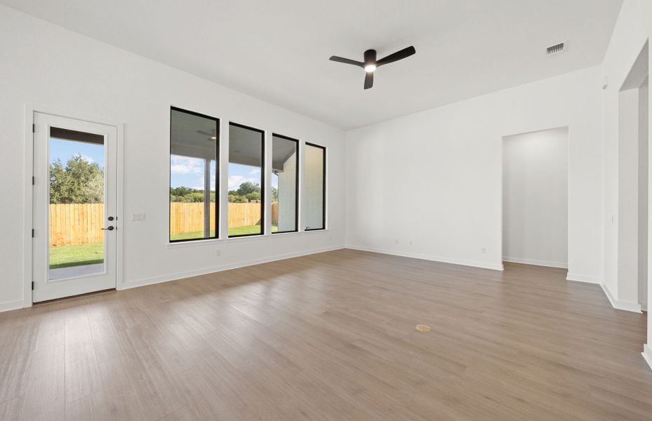Representative unfurnished interior of a home built from the Dobbin by Pulte Homes in 6 Creeks, Kyle (Image 32).