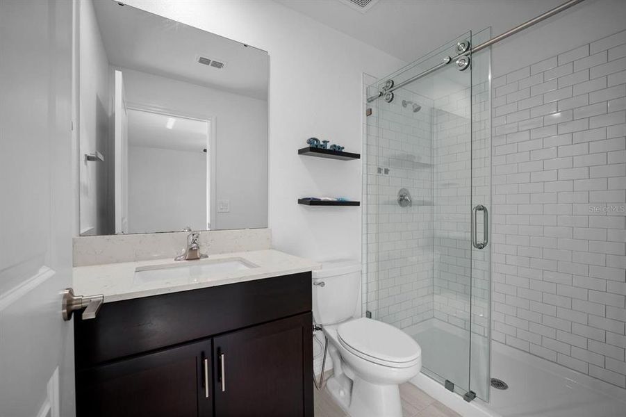 Furnished interior view inside a new home in North Park Isle, Plant City (Image 9).