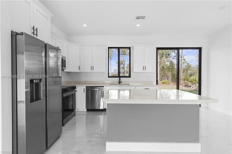 Furnished interior view inside a new home in , Lehigh Acres (Image 5).