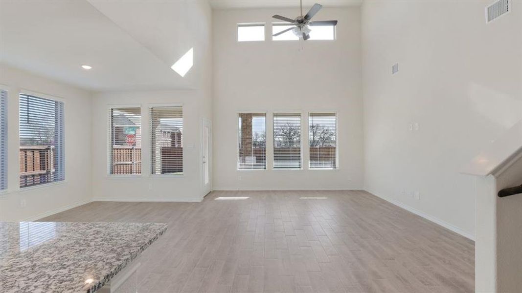 Spacious, unfurnished interior of a new home in Prairie Oaks, Oak Point (Image 8).