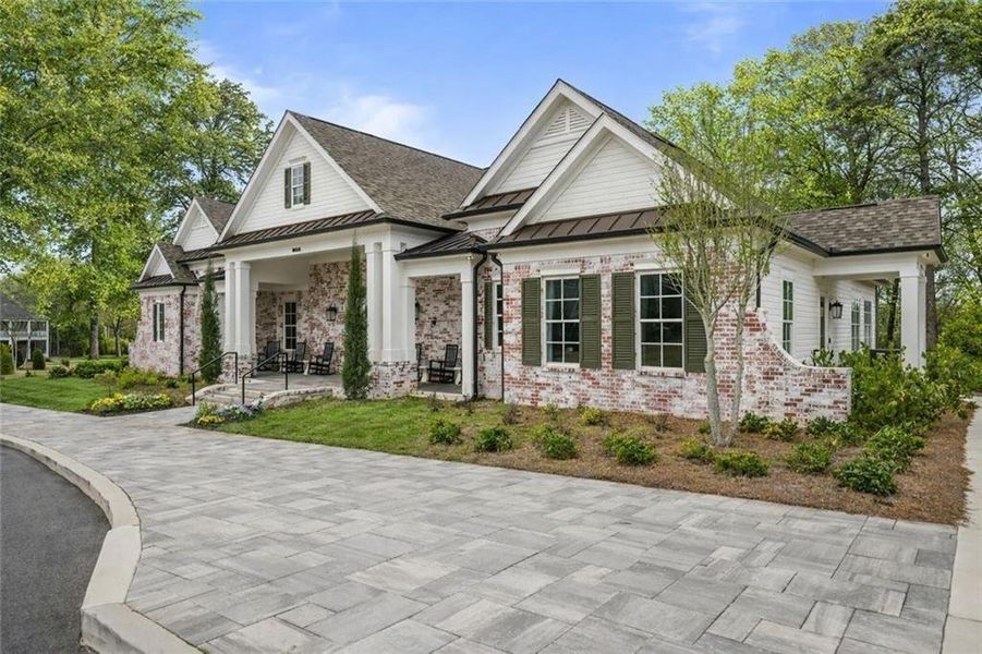Front exterior of a new home in Waterside Single Family, Peachtree Corners, GA, highlighting curb appeal (Image 1). Front exterior of a new home in Waterside Single Family, Peachtree Corners, GA, highlighting curb appeal (Image 1).