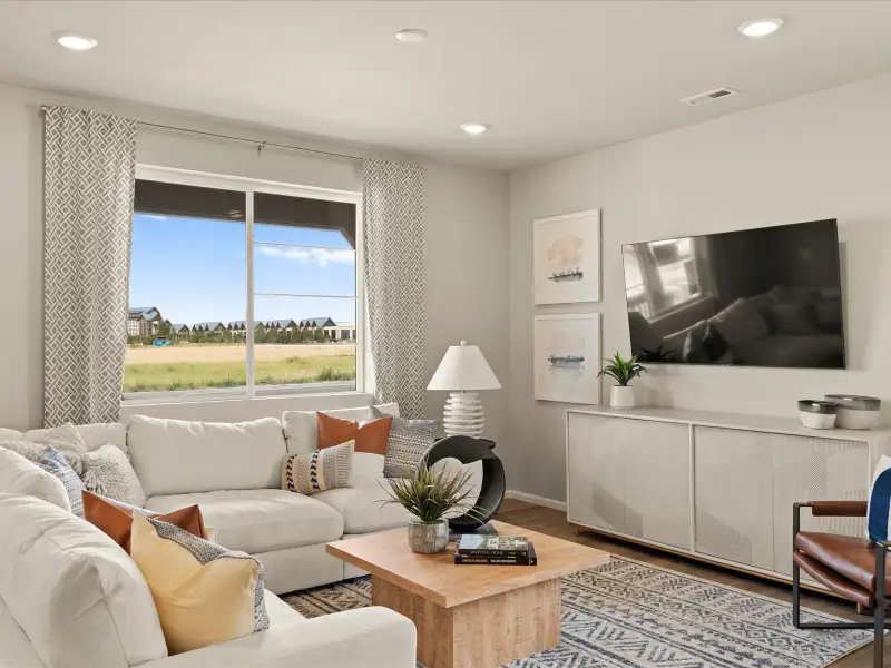 Furnished interior view inside a new home in Skyview at High Point, Aurora (Image 3).