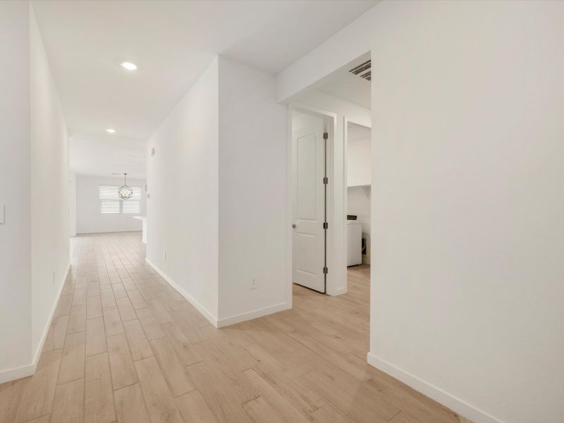Spacious, unfurnished interior of a new home in Rancho Mirage Signature Series, Maricopa (Image 10).