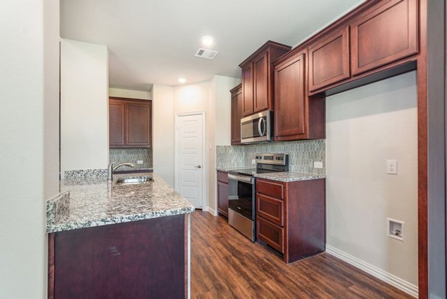 Furnished interior view inside a new home in Courts Of Bonnie Brae, Denton (Image 7).