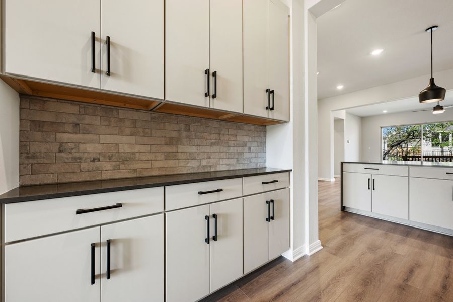Representative furnished interior of a home built from the Maxwell by Ashton Woods in The Estates at La Cima, San Marcos (Image 14). Representative furnished interior of a home built from the Maxwell by Ashton Woods in The Estates at La Cima, San Marcos (Image 14).