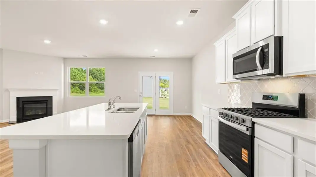 Furnished interior view inside a new home in Preserve at Dove Creek, Statham (Image 6).
