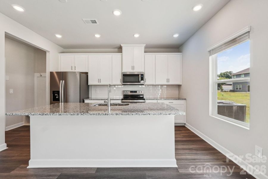 Photo is not of the actual home, but is an inspirational photo of builder’s model home and may depict options, furnishings, and/or decorator features that are not included