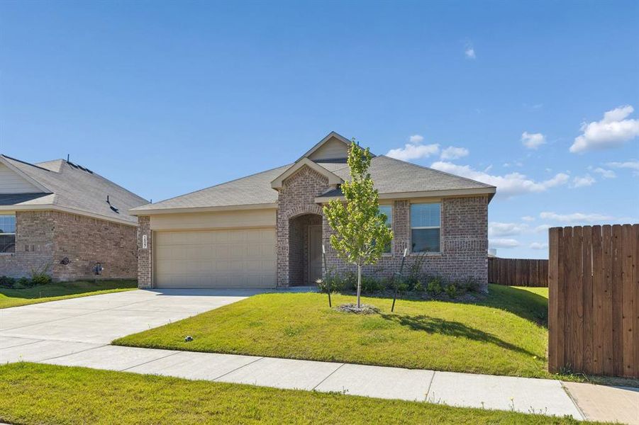 Front exterior of a new home in Eastland, Crandall, TX, highlighting curb appeal (Image 2).