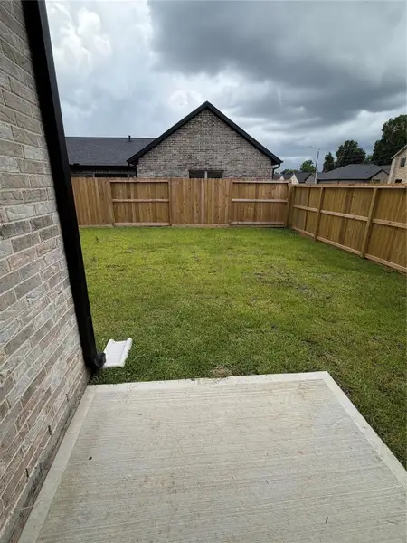 Exterior details and patio area of a home in , Spring (Image 3).