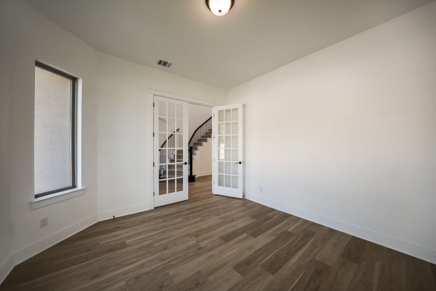 Representative unfurnished interior of a home built from the The Travis by Whitestone Custom Homes in Johnson Ranch, Bulverde (Image 37).