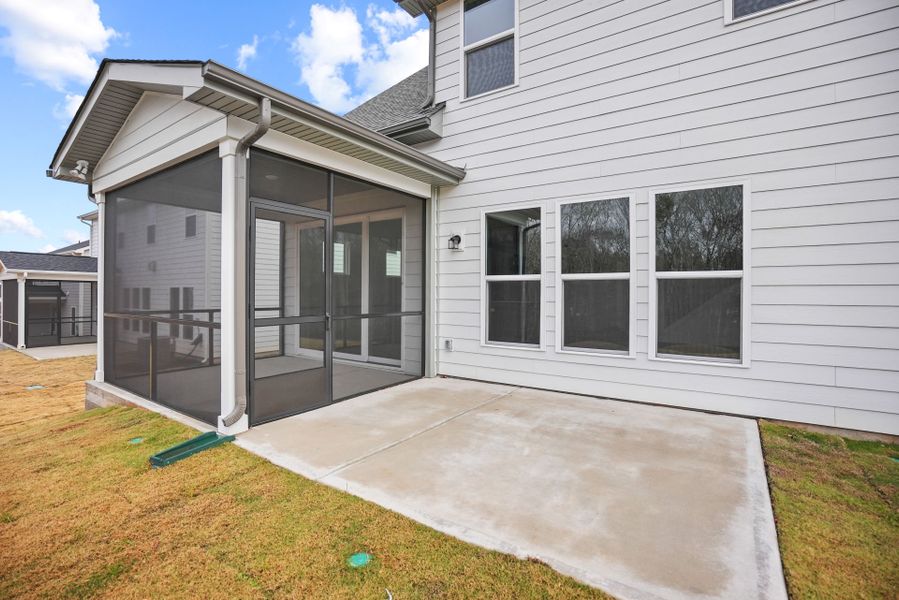 Exterior details and patio area of a home in Forest Creek, Waxhaw (Image 4).