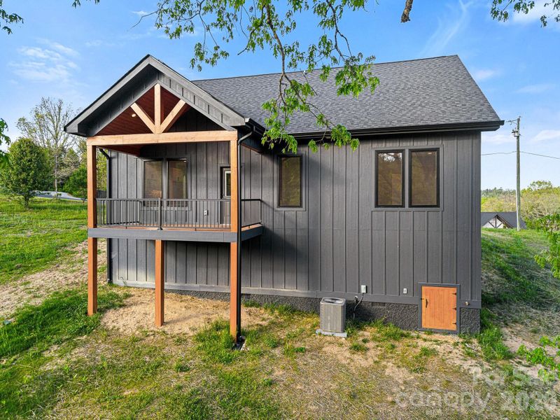 Exterior details and patio area of a home in , Alexander (Image 3).