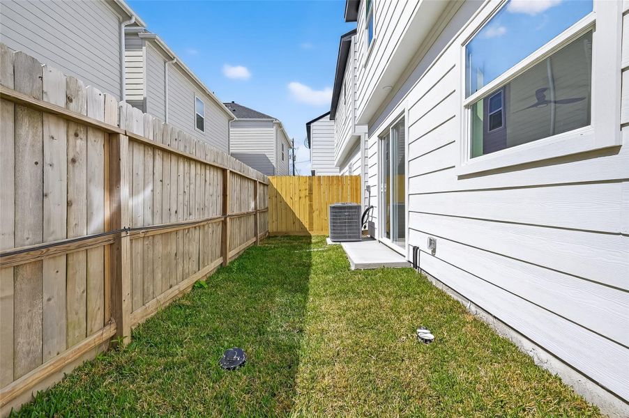 Exterior details and patio area of a home in , Houston (Image 25). Exterior details and patio area of a home in , Houston (Image 25).