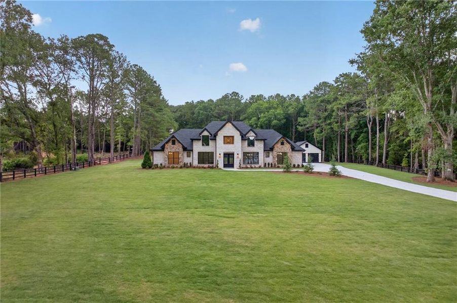 Front exterior of a new home in , Monroe, GA, highlighting curb appeal (Image 30).