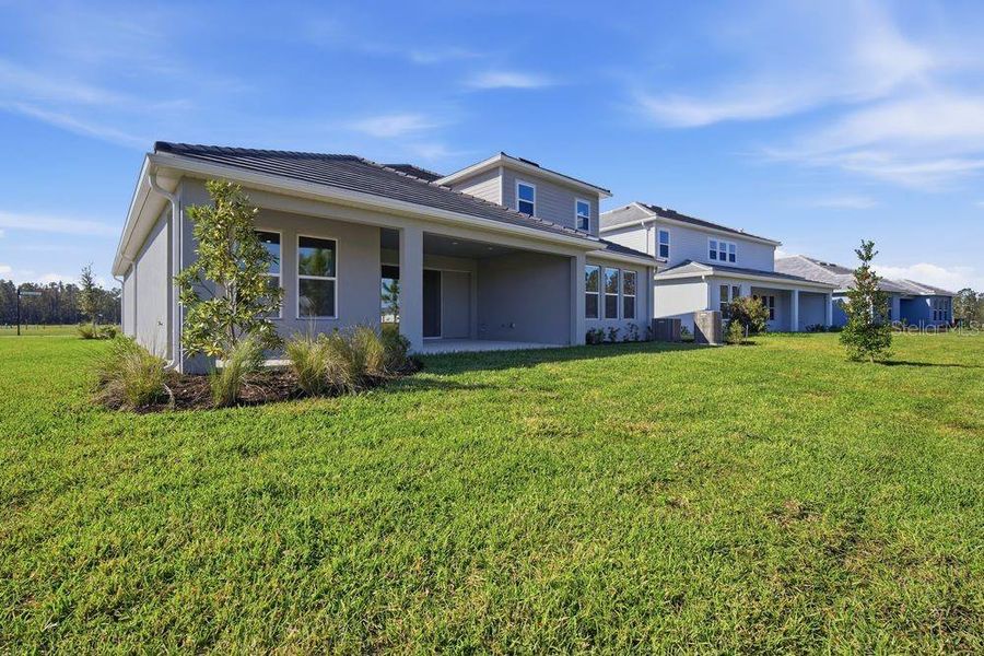 Exterior details and patio area of a home in Hammock at Two Rivers, Zephyrhills (Image 3). Exterior details and patio area of a home in Hammock at Two Rivers, Zephyrhills (Image 3).