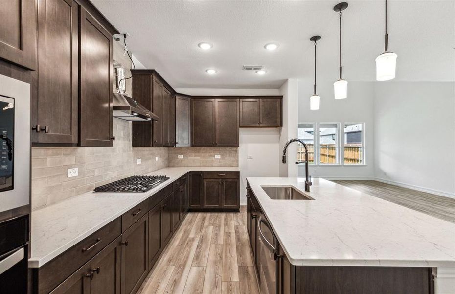 Bright kitchen with ample cabinet space*real home pictured