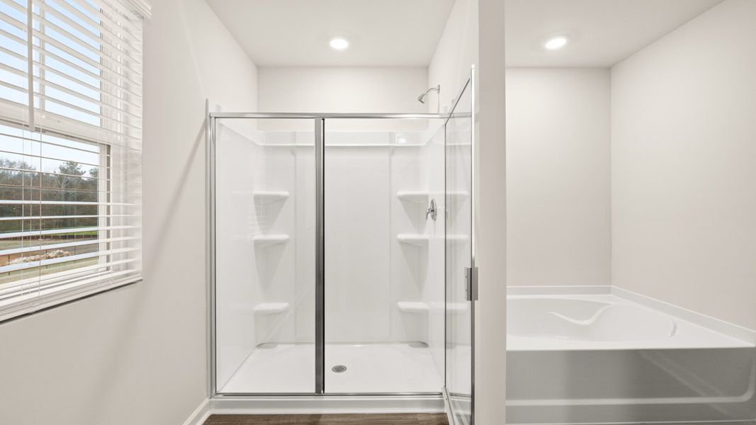 Representative furnished interior of a home built from the Galen by D.R. Horton in Champion's Run, Lithonia (Image 9).