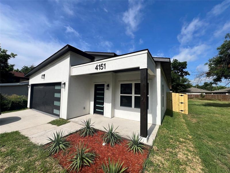 Front exterior of a new home in , Dallas, TX, highlighting curb appeal (Image 1). Front exterior of a new home in , Dallas, TX, highlighting curb appeal (Image 1).