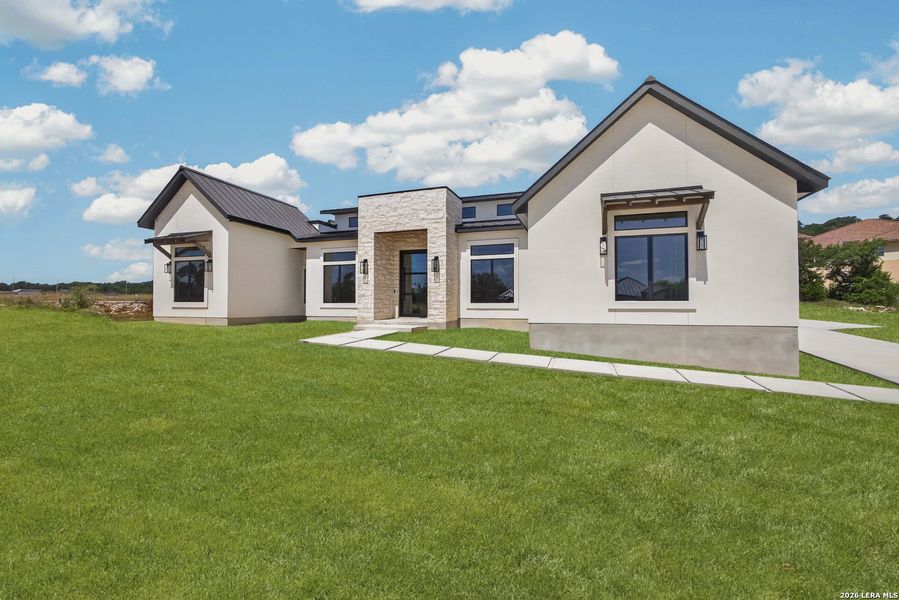 Front exterior of a new home in , San Antonio, TX, highlighting curb appeal (Image 25).