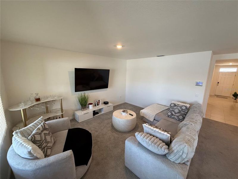 Furnished interior view inside a new home in Cypress Park Estates, Haines City (Image 14).